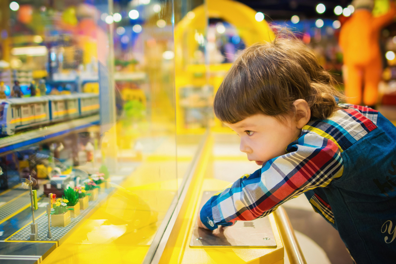 kid looking at toys
